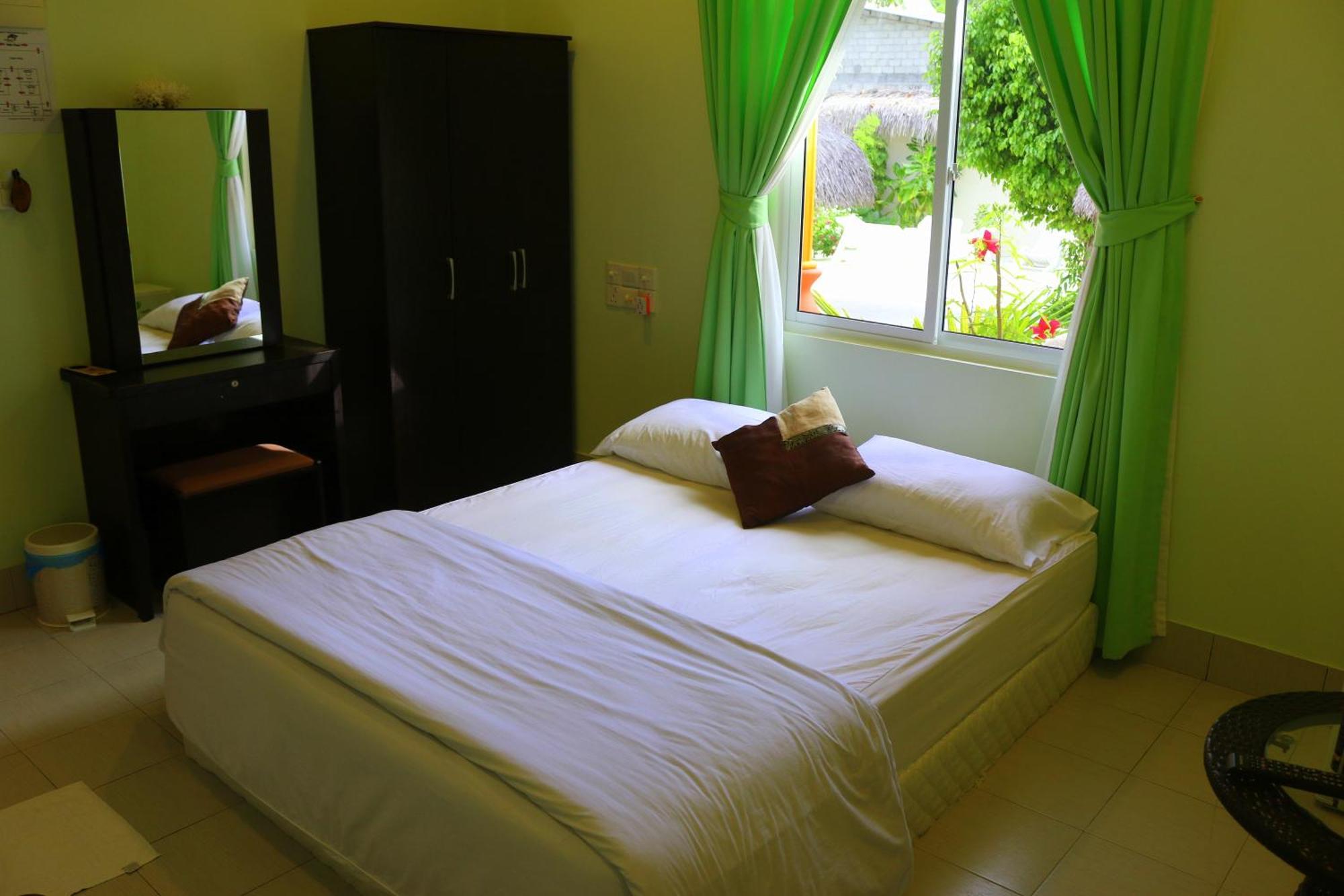 Ras Beach Inn Rasdhoo Esterno foto
